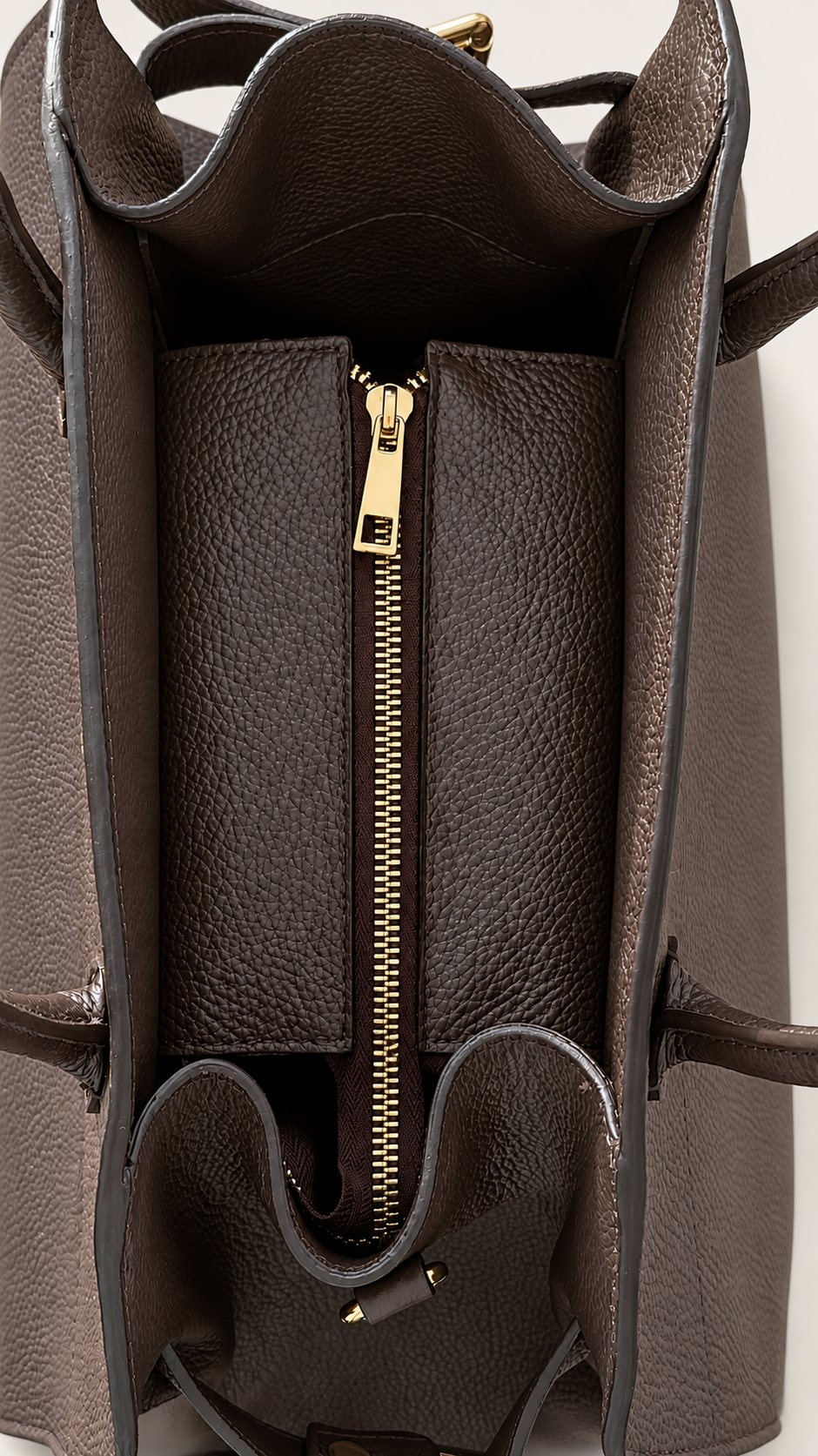 Zip-top closure of the LISHÉ Vira Moka leather bag, fully closed